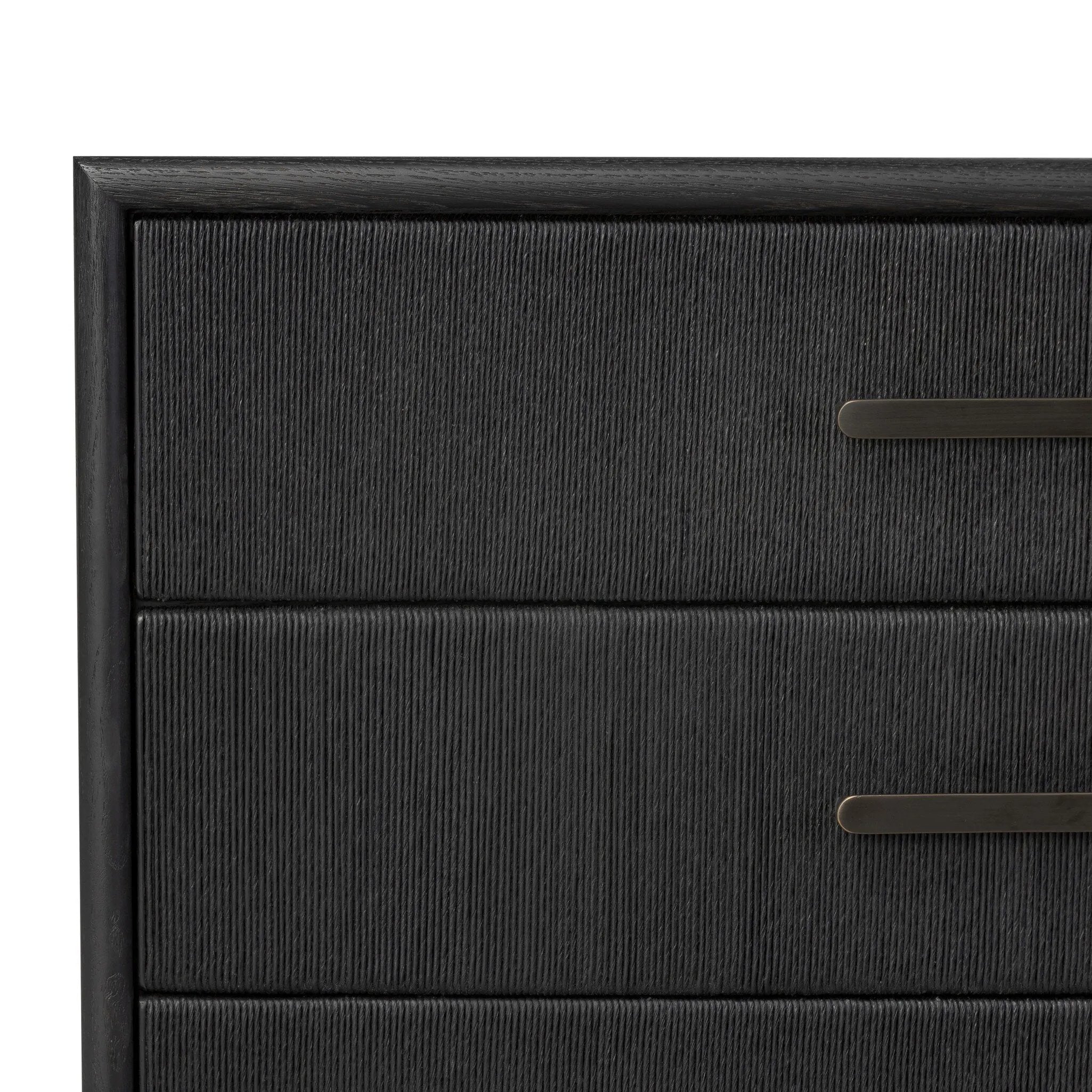 Elevate your bedroom styling with a storage-driven dresser of black-finished oak. A smooth top pairs with eight spacious drawers covered with woven paper cord. The result: a dark, Scandinavian-inspired look that will work into your collection beautifully Amethyst Home provides interior design, new home construction design consulting, vintage area rugs, and lighting in the Newport Beach metro area.