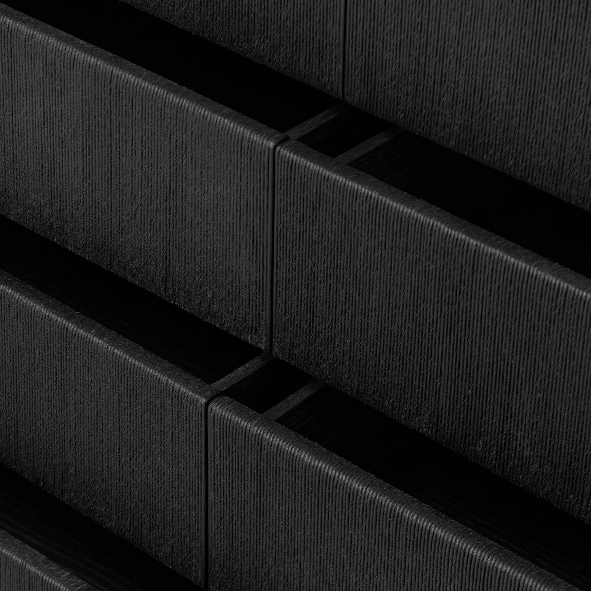 Elevate your bedroom styling with a storage-driven dresser of black-finished oak. A smooth top pairs with eight spacious drawers covered with woven paper cord. The result: a dark, Scandinavian-inspired look that will work into your collection beautifully Amethyst Home provides interior design, new home construction design consulting, vintage area rugs, and lighting in the Scottsdale metro area.