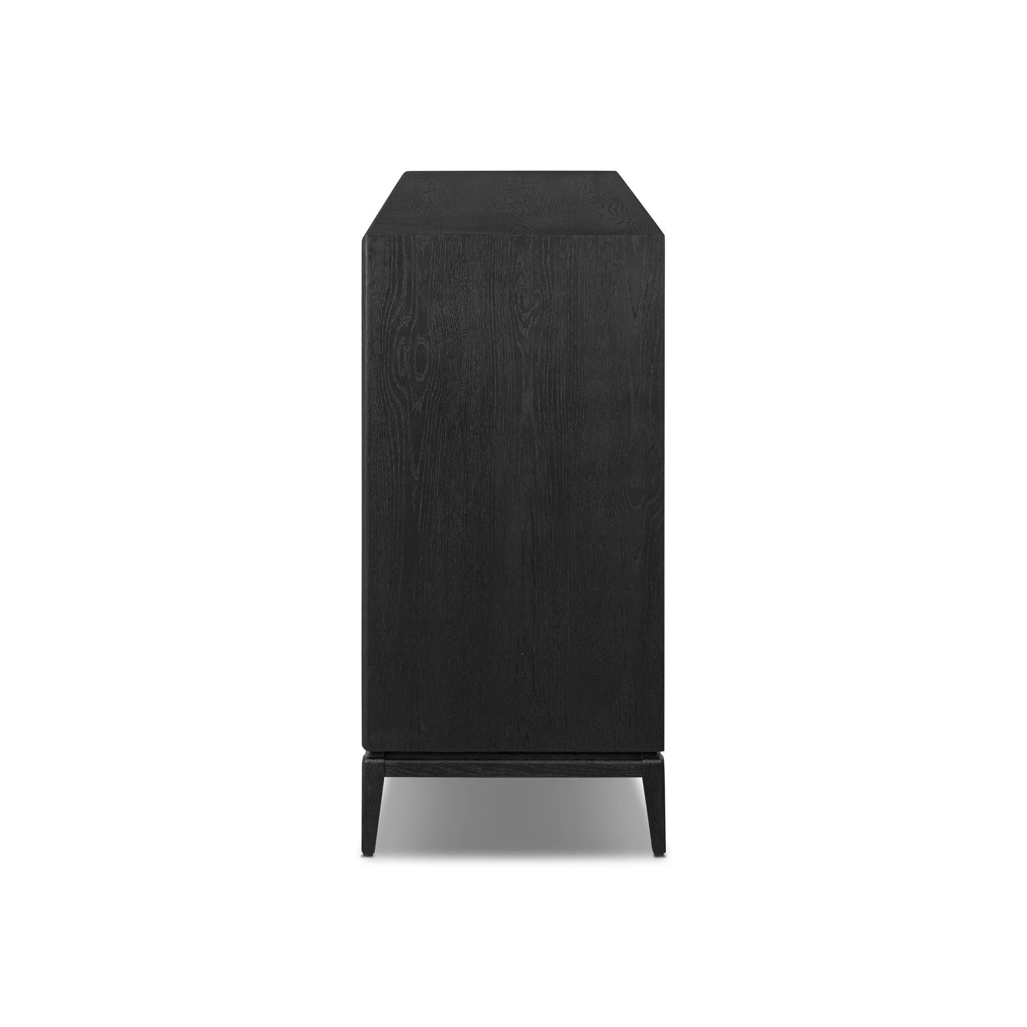 Elevate your bedroom styling with a storage-driven dresser of black-finished oak. A smooth top pairs with eight spacious drawers covered with woven paper cord. The result: a dark, Scandinavian-inspired look that will work into your collection beautifully Amethyst Home provides interior design, new home construction design consulting, vintage area rugs, and lighting in the Washington metro area.