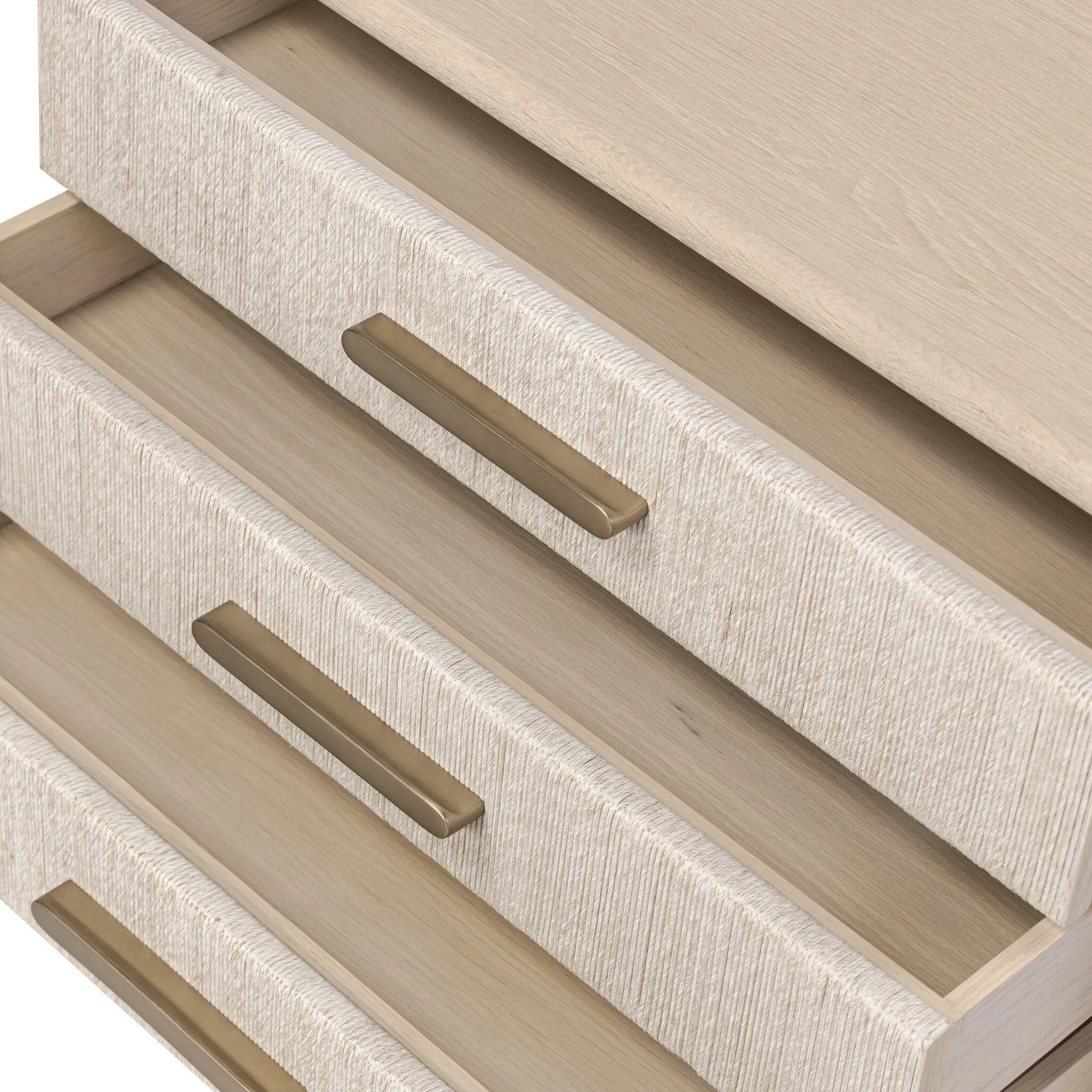 Elevate your bedside storage with a nightstand of light, natural oak. A smooth top pairs with three drawer fronts of woven paper cord for a clean, Scandinavian-inspired look that will work into your bedroom collection beautifully Amethyst Home provides interior design, new home construction design consulting, vintage area rugs, and lighting in the Dallas metro area.