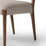 Enhance your dining experience with the Rothler Alcala Wheat Dining Chair. Crafted with high-quality materials, this dining chair provides both comfort and style. Its elegant design adds a touch of sophistication to any dining room. Get ready to dine in luxury. Amethyst Home provides interior design, new home construction design consulting, vintage area rugs, and lighting in the Boston metro area.