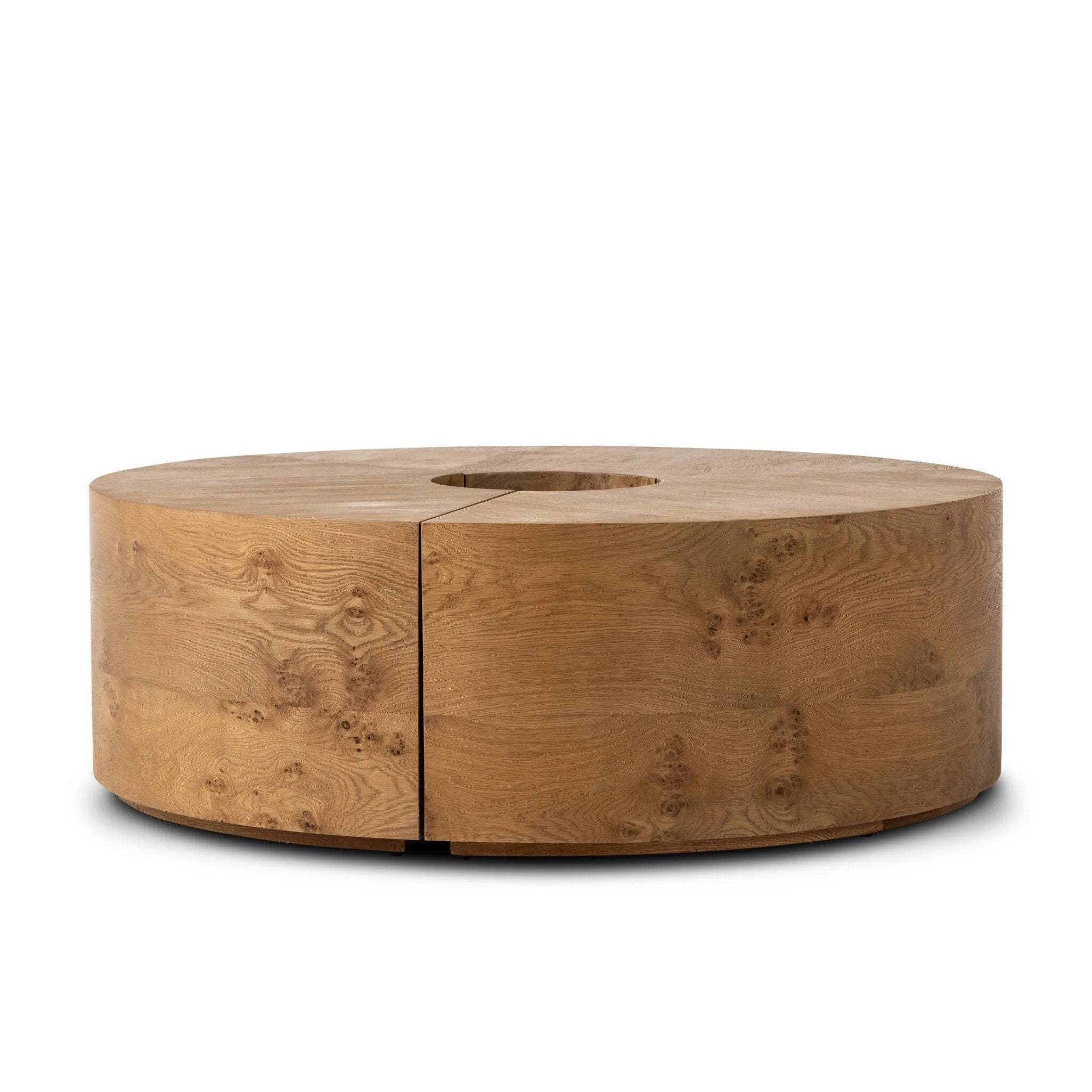 A coffee table that moves with you. Made from oak burl veneer with beautiful movement, this three-piece design pulls apart to create different looks and configurations based on your needs. Pushed together, individual pieces shape a circle; create a wave shape touching just the end pieces together — or, style all three apart. Amethyst Home provides interior design, new home construction design consulting, vintage area rugs, and lighting in the Boston metro area.