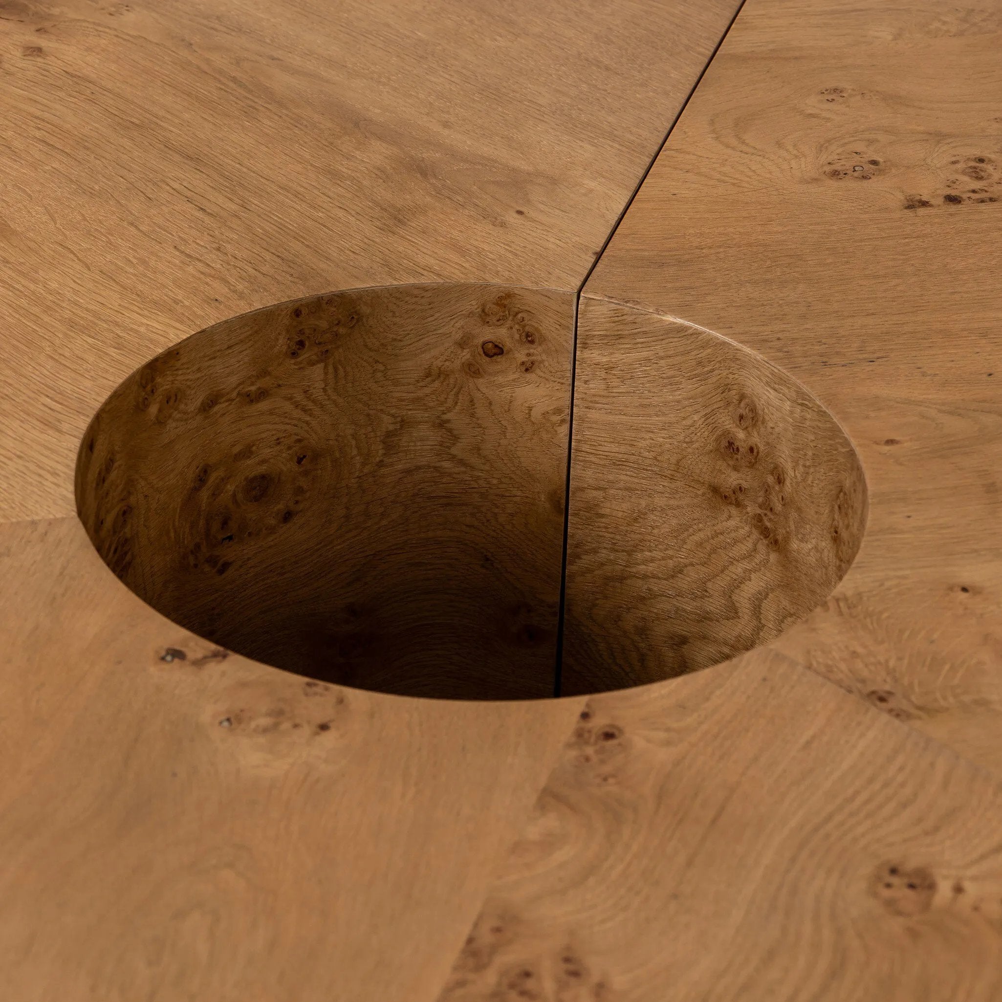 A coffee table that moves with you. Made from oak burl veneer with beautiful movement, this three-piece design pulls apart to create different looks and configurations based on your needs. Pushed together, individual pieces shape a circle; create a wave shape touching just the end pieces together — or, style all three apart. Amethyst Home provides interior design, new home construction design consulting, vintage area rugs, and lighting in the Des Moines metro area.
