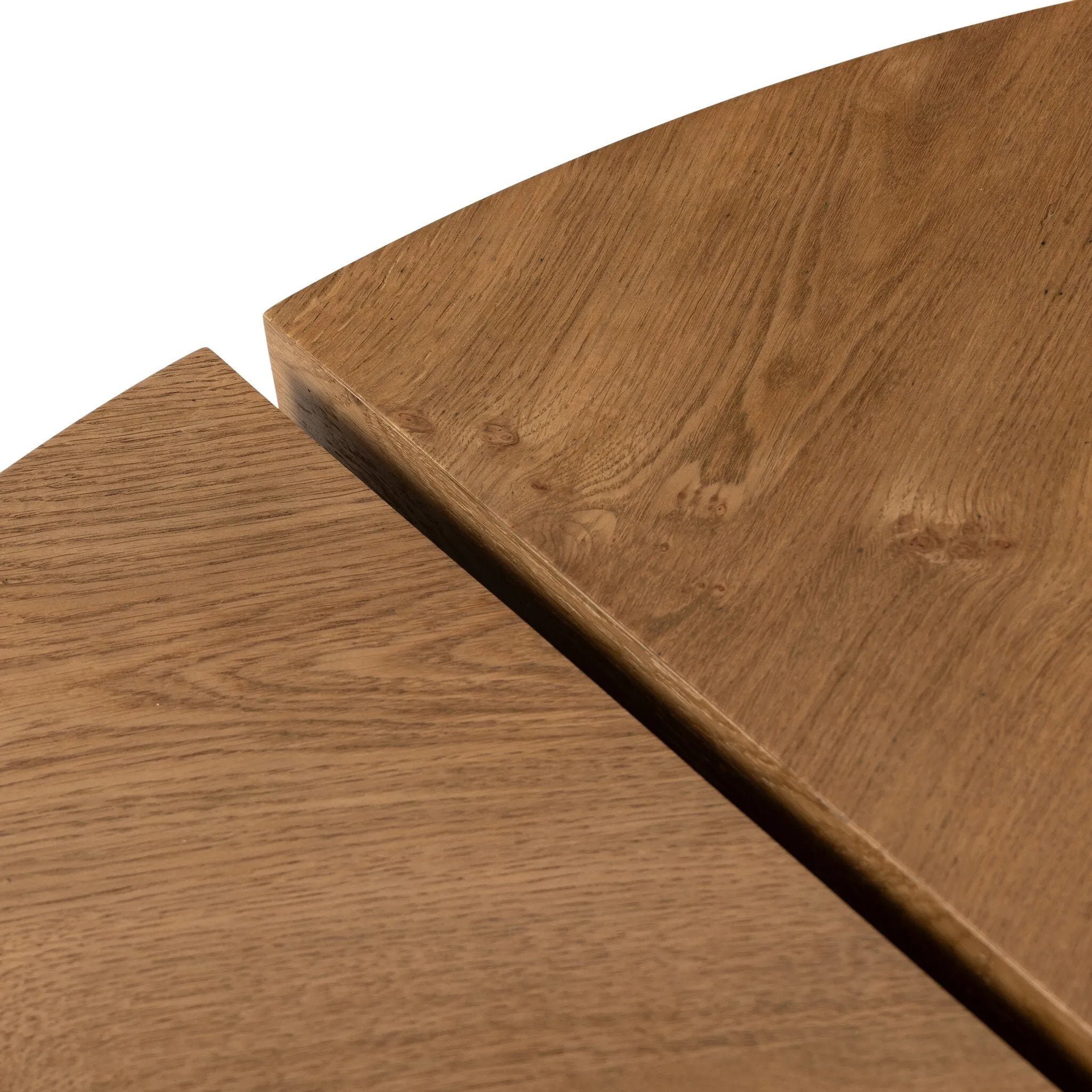 A coffee table that moves with you. Made from oak burl veneer with beautiful movement, this three-piece design pulls apart to create different looks and configurations based on your needs. Pushed together, individual pieces shape a circle; create a wave shape touching just the end pieces together — or, style all three apart. Amethyst Home provides interior design, new home construction design consulting, vintage area rugs, and lighting in the Kansas City metro area.