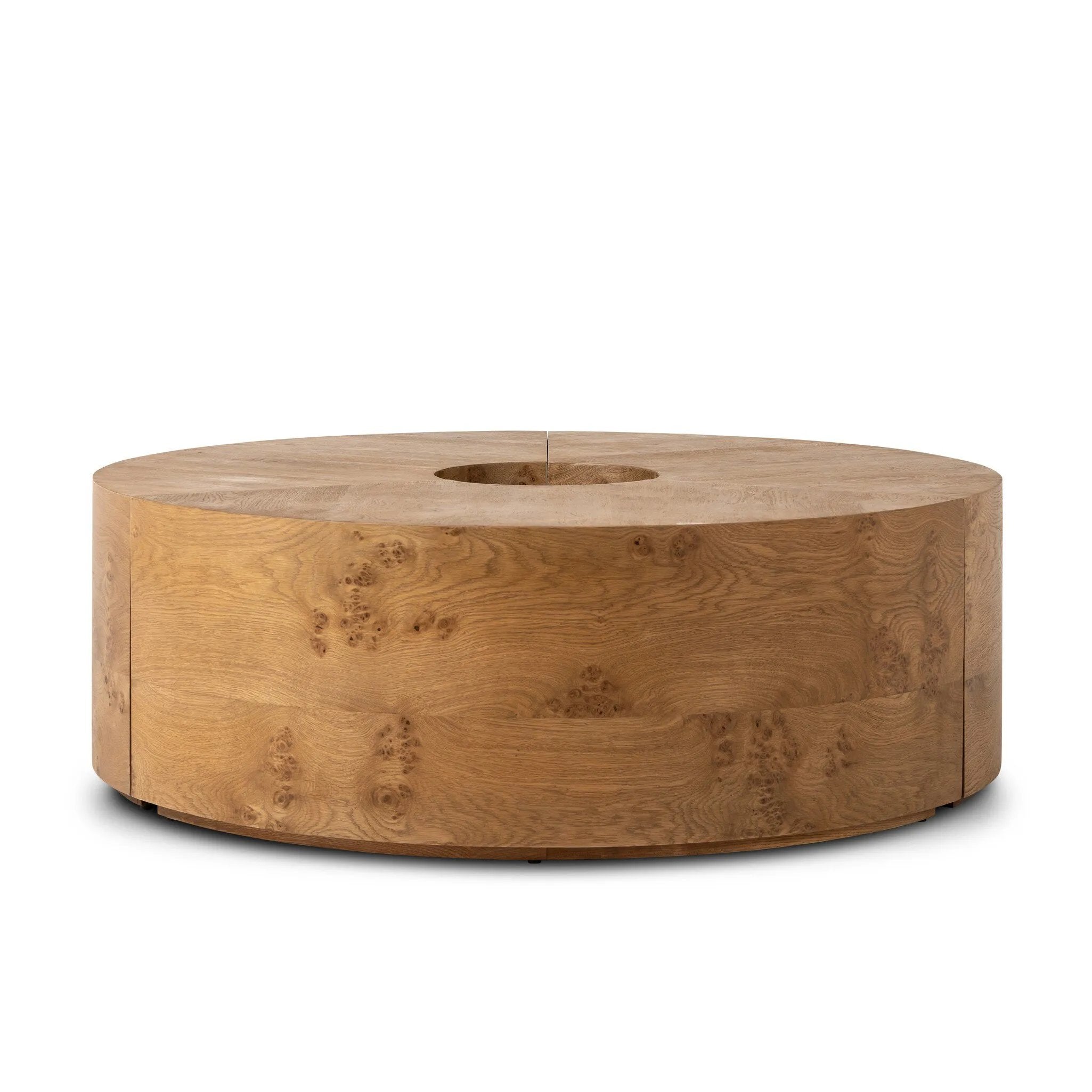 A coffee table that moves with you. Made from oak burl veneer with beautiful movement, this three-piece design pulls apart to create different looks and configurations based on your needs. Pushed together, individual pieces shape a circle; create a wave shape touching just the end pieces together — or, style all three apart. Amethyst Home provides interior design, new home construction design consulting, vintage area rugs, and lighting in the Tampa metro area.
