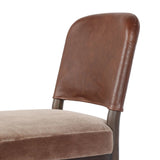 A moody, mixed material look that stands out. A velvety, wool-blend seat and top-grain leather, seat back are framed by solid