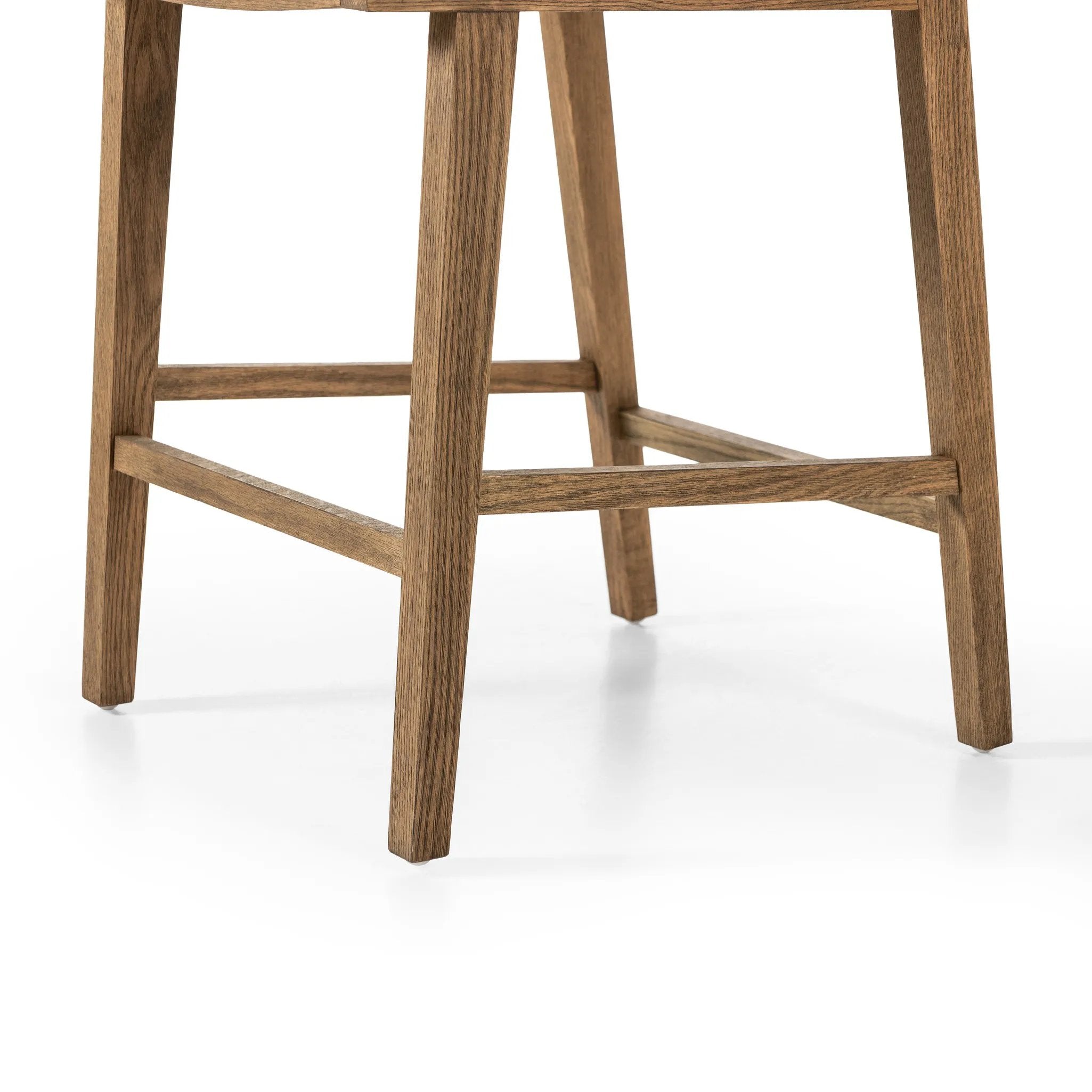 Featuring Sage Savile Flax Bar + Counter Stool by Four Hands at Amethyst Home. Mixed materials make the chair. Solid natural beech wood features a natural cane back for extra texture, while a butterscotch-finished faux leather seat serves total comfort.BarOverall Dimensions: 20.50"w x 23.00"d x 42.50"hWeight: 22.05 lbsCounterOverall Dimensions: 20.50"w. Amethyst Home provides interior design, new home construction design consulting, vintage area rugs, and lighting in the Salt Lake City metro area.