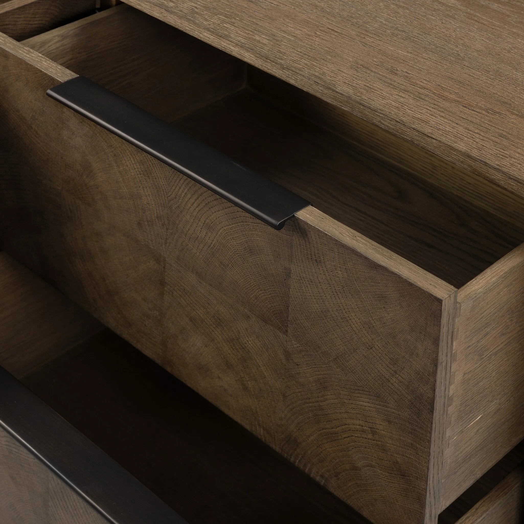 This media console’s simple frame showcases thick brown oak veneer with an oyster cut grid pattern on the door and drawer fronts. Minimalist metal pulls open to ample storage for living space essentials. Rear cutouts for cord management.As lovers of luxe style at Amethyst, we love the designer inspired Salta Media Console - Brown Oak Thick Veneer. Amethyst Home provides interior design, new home construction design consulting, vintage area rugs, and lighting in the Winter Garden metro area.