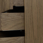 Influenced by contemporary design, this nightstand’s simple frame showcases thick brown oak veneer with a tiled oyster cut pattern on the insert panels. Three drawers with minimalist metal pulls offer ample space for bedside essentials. Amethyst Home provides interior design, new home construction design consulting, vintage area rugs, and lighting in the Los Angeles metro area.