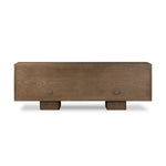 Grounding and stunning. We paired a modern frame and chunky base with door panels featuring oyster cuts of oak that take a specialized skill to create. Each cut captures the story of the wood and brings a natural, organic rhythm to the entire sideboard, and any space. Amethyst Home provides interior design, new home construction design consulting, vintage area rugs, and lighting in the Calabasas metro area.