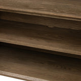 Grounding and stunning. We paired a modern frame and chunky base with door panels featuring oyster cuts of oak that take a specialized skill to create. Each cut captures the story of the wood and brings a natural, organic rhythm to the entire sideboard, and any space. Amethyst Home provides interior design, new home construction design consulting, vintage area rugs, and lighting in the Monterey metro area.