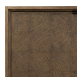 Grounding and stunning. We paired a modern frame and chunky base with door panels featuring oyster cuts of oak that take a specialized skill to create. Each cut captures the story of the wood and brings a natural, organic rhythm to the entire sideboard, and any space. Amethyst Home provides interior design, new home construction design consulting, vintage area rugs, and lighting in the San Diego metro area.