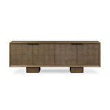 Grounding and stunning. We paired a modern frame and chunky base with door panels featuring oyster cuts of oak that take a specialized skill to create. Each cut captures the story of the wood and brings a natural, organic rhythm to the entire sideboard, and any space. Amethyst Home provides interior design, new home construction design consulting, vintage area rugs, and lighting in the Washington metro area.