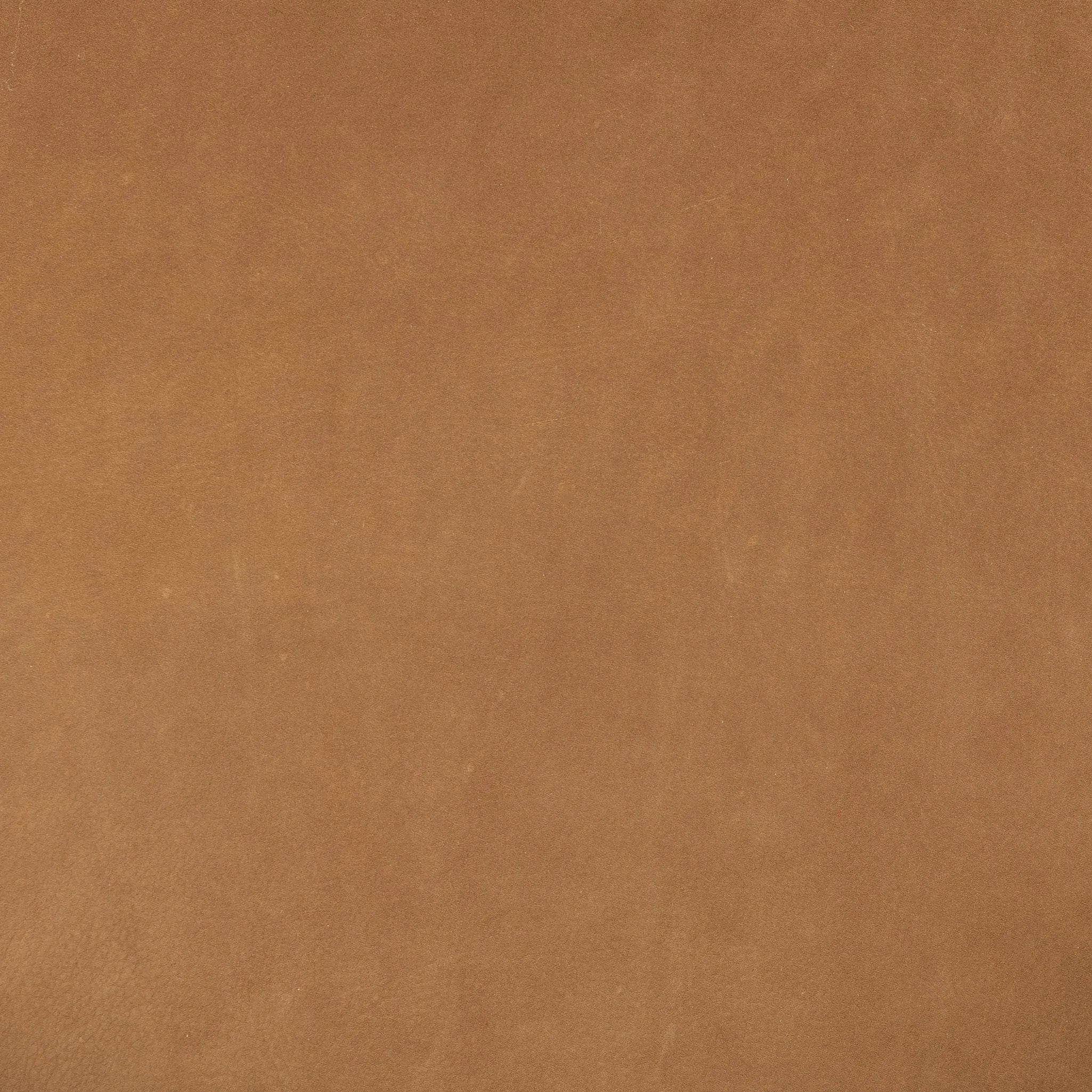 Featuring Sandro Nubuck Cognac Chair by Four Hands at Amethyst Home. This versatile accent chair is upholstered in a faux Mongolian shearling with a textural high pile. A contrasting, chunky parawood frame hugs the seat and is wire-brushed for a warm, vintage feel.Overall Dimensions: 29.50"w x 41.00"d x 32.00"hWeight : 45.19 lbsMaterials : Top Grain Leat. Amethyst Home provides interior design, new home construction design consulting, vintage area rugs, and lighting in the Laguna Beach metro area.