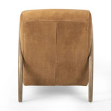 Featuring Sandro Nubuck Cognac Chair by Four Hands at Amethyst Home. This versatile accent chair is upholstered in a faux Mongolian shearling with a textural high pile. A contrasting, chunky parawood frame hugs the seat and is wire-brushed for a warm, vintage feel.Overall Dimensions: 29.50"w x 41.00"d x 32.00"hWeight : 45.19 lbsMaterials : Top Grain Leath. Amethyst Home provides interior design, new home construction design consulting, vintage area rugs, and lighting in the Los Angeles metro area.