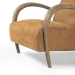 Featuring Sandro Nubuck Cognac Chair by Four Hands at Amethyst Home. This versatile accent chair is upholstered in a faux Mongolian shearling with a textural high pile. A contrasting, chunky parawood frame hugs the seat and is wire-brushed for a warm, vintage feel.Overall Dimensions: 29.50"w x 41.00"d x 32.00"hWeight : 45.19 lbsMaterials : Top Grain Leather. Amethyst Home provides interior design, new home construction design consulting, vintage area rugs, and lighting in the Nashville metro area.