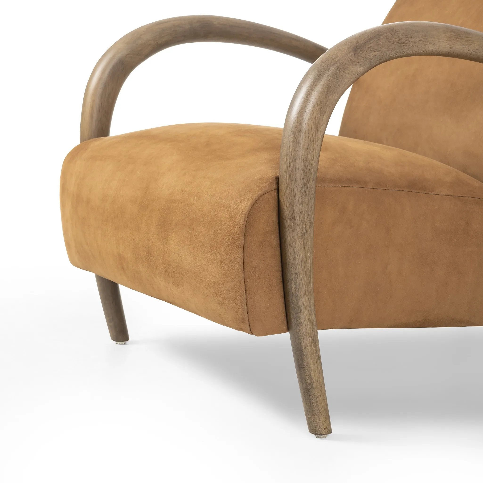 Featuring Sandro Nubuck Cognac Chair by Four Hands at Amethyst Home. This versatile accent chair is upholstered in a faux Mongolian shearling with a textural high pile. A contrasting, chunky parawood frame hugs the seat and is wire-brushed for a warm, vintage feel.Overall Dimensions: 29.50"w x 41.00"d x 32.00"hWeight : 45.19 lbsMaterials : Top Grain Leather. Amethyst Home provides interior design, new home construction design consulting, vintage area rugs, and lighting in the Nashville metro area.