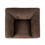 Inspired by 1970s brutalism, this urban swivel chair balances a rounded solid wood plinth with a curved seat deck and a relaxed, "wrinkled" upholstery design. Feather-blend cushions wrap the frame, finished with dramatic blind tufting for a hand-crafted, textural edge. Amethyst Home provides interior design, new home construction design consulting, vintage area rugs, and lighting in the Austin metro area.