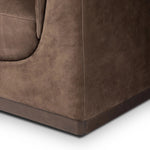 Inspired by 1970s brutalism, this urban swivel chair balances a rounded solid wood plinth with a curved seat deck and a relaxed, "wrinkled" upholstery design. Feather-blend cushions wrap the frame, finished with dramatic blind tufting for a hand-crafted, textural edge. Amethyst Home provides interior design, new home construction design consulting, vintage area rugs, and lighting in the Salt Lake City metro area.