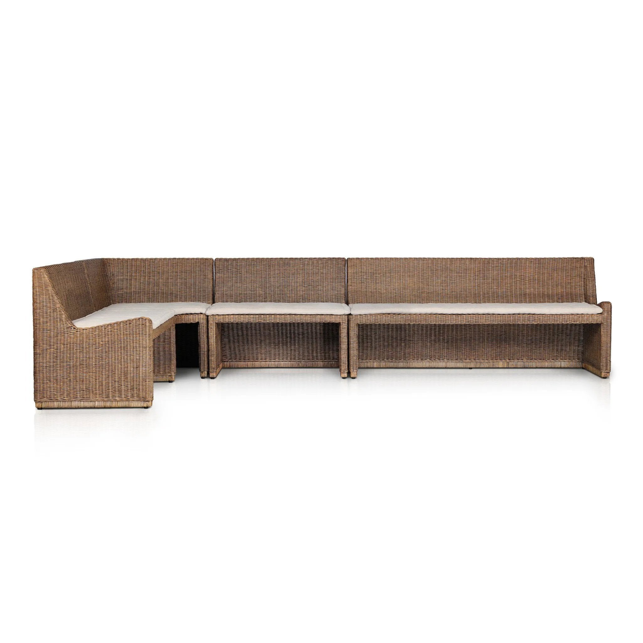 Antique-inspired coastal style. Rattan introduces varying natural shades and texture to this dining bench, and the frame's soft lines and fabric cushion invite a comfortable sit. Option to style alone or pair with other pieces in the collection. A design collaboration by Amber Lewis and Four Hands. Amethyst Home provides interior design, new home construction design consulting, vintage area rugs, and lighting in the Newport Beach metro area.