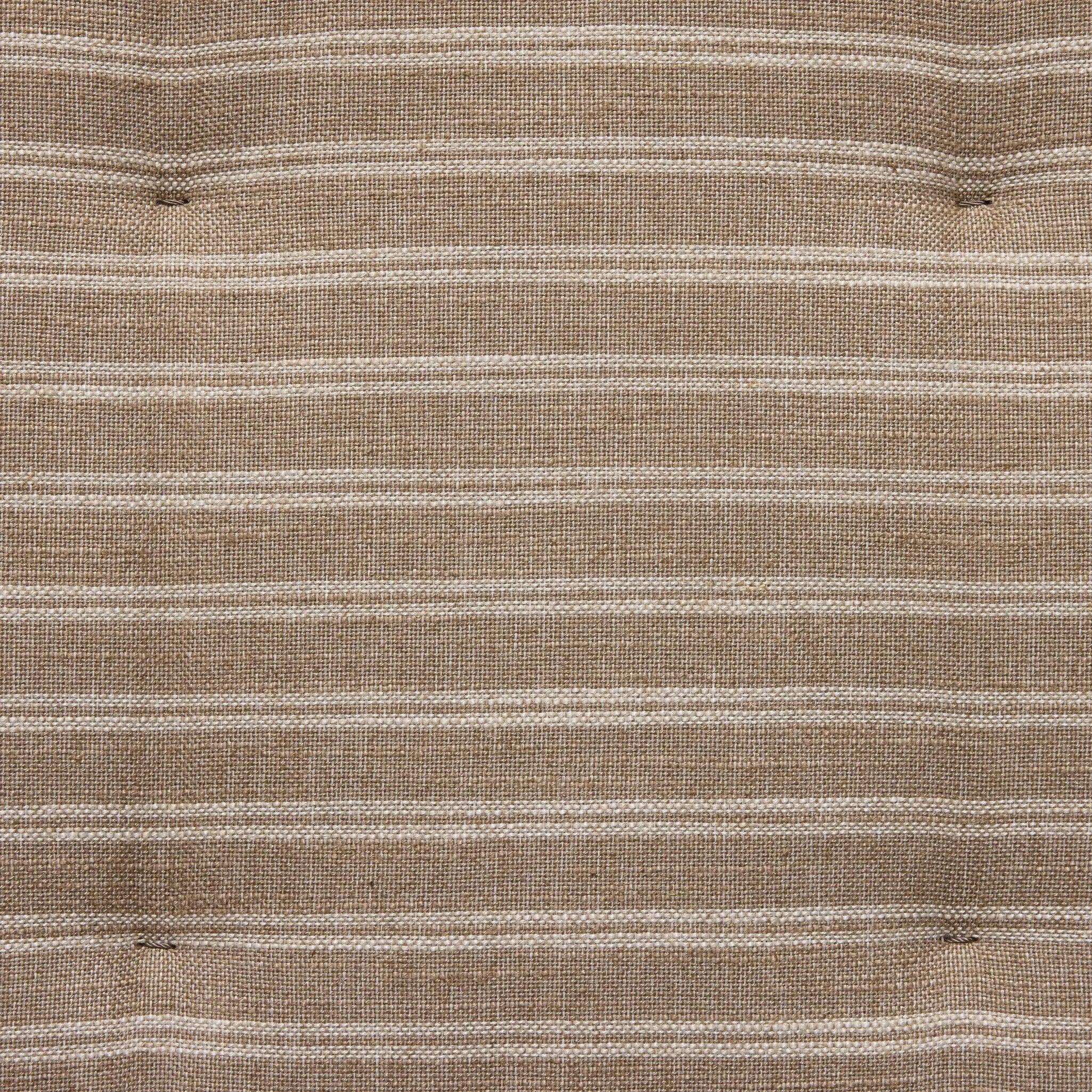 Antique-inspired coastal style. Rattan introduces varying natural shades and texture to this dining bench, and the frame's soft lines and beige and white striped fabric cushion invite a comfortable sit. Option to style alone or pair with other pieces in the collection. A design collaboration by Amber Lewis and Four Hands. Amethyst Home provides interior design, new home construction design consulting, vintage area rugs, and lighting in the Dallas metro area.