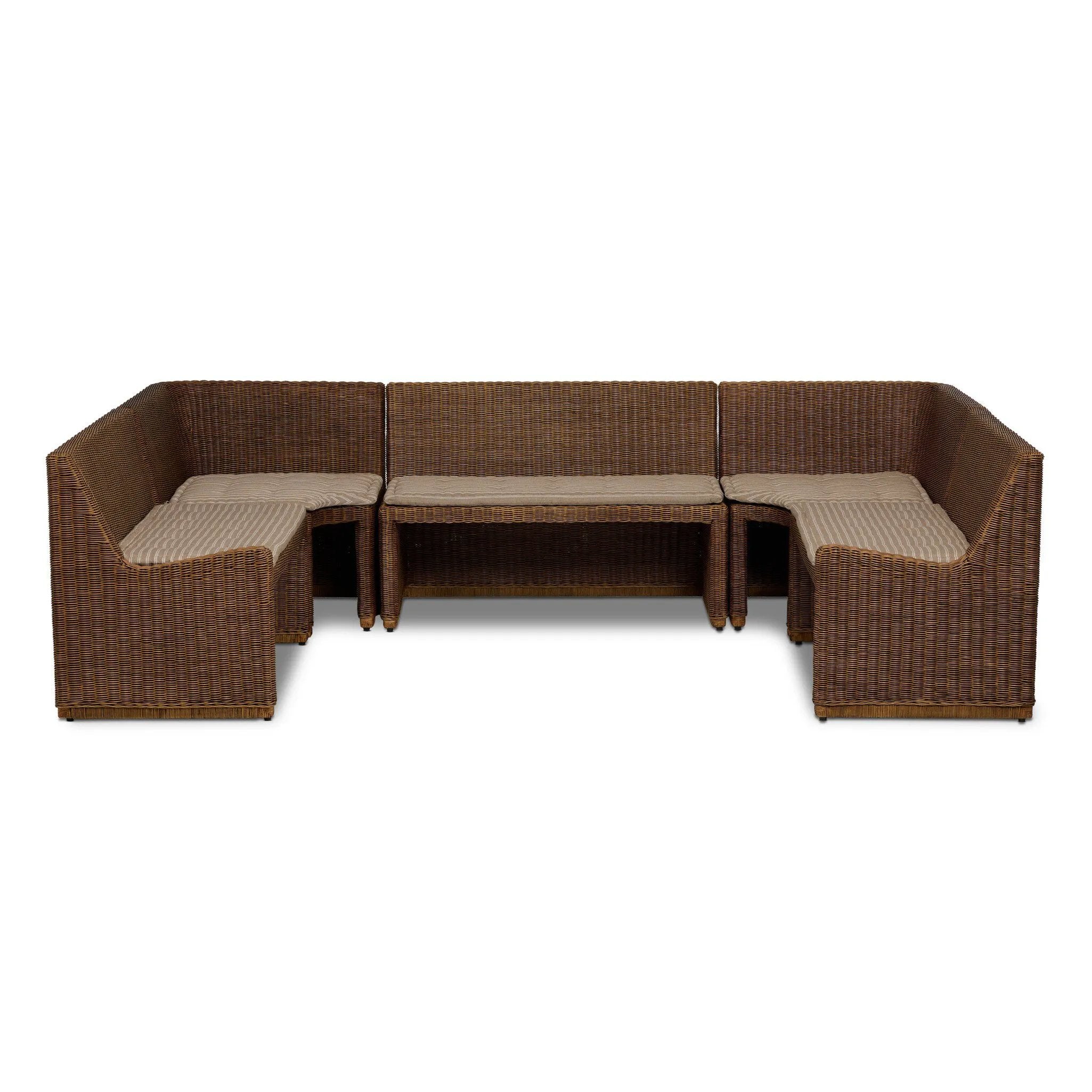 Antique-inspired coastal style. Rattan introduces varying natural shades and texture to this dining bench, and the frame's soft lines and beige and white striped fabric cushion invite a comfortable sit. Option to style alone or pair with other pieces in the collection. A design collaboration by Amber Lewis and Four Hands. Amethyst Home provides interior design, new home construction design consulting, vintage area rugs, and lighting in the Houston metro area.