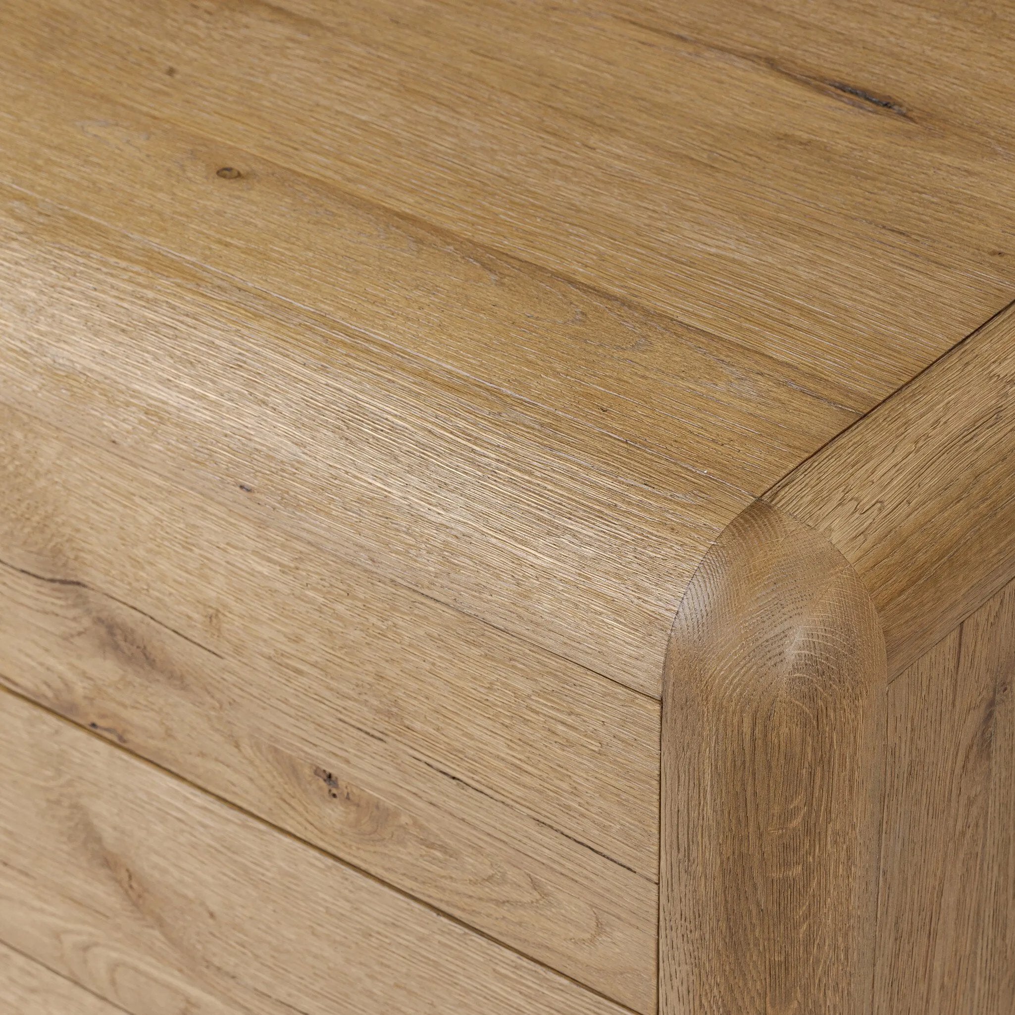 Blending modern design with classic features, this dresser is at once soft and bold. Set low to the ground on rounded feet, the dresser has prominent rounded corners that emphasize its smooth finish. Crafted from solid warm oak and veneers with push-latch hardware for a clean front Amethyst Home provides interior design, new home construction design consulting, vintage area rugs, and lighting in the Kansas City metro area.