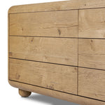 Blending modern design with classic features, this dresser is at once soft and bold. Set low to the ground on rounded feet, the dresser has prominent rounded corners that emphasize its smooth finish. Crafted from solid warm oak and veneers with push-latch hardware for a clean front Amethyst Home provides interior design, new home construction design consulting, vintage area rugs, and lighting in the Salt Lake City metro area.