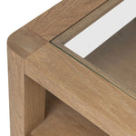 Bring bonus storage and a light look to the living space. Made from sandy oak and clear tempered glass with a single drawer, shelving beneath the glass doubles as a shadowbox or an extra display surface.As lovers of clean materials at Amethyst, we love the designer inspired Shiloh End Table - Tempered Glass. Amethyst Home provides interior design, new home construction design consulting, vintage area rugs, and lighting in the Austin metro area.