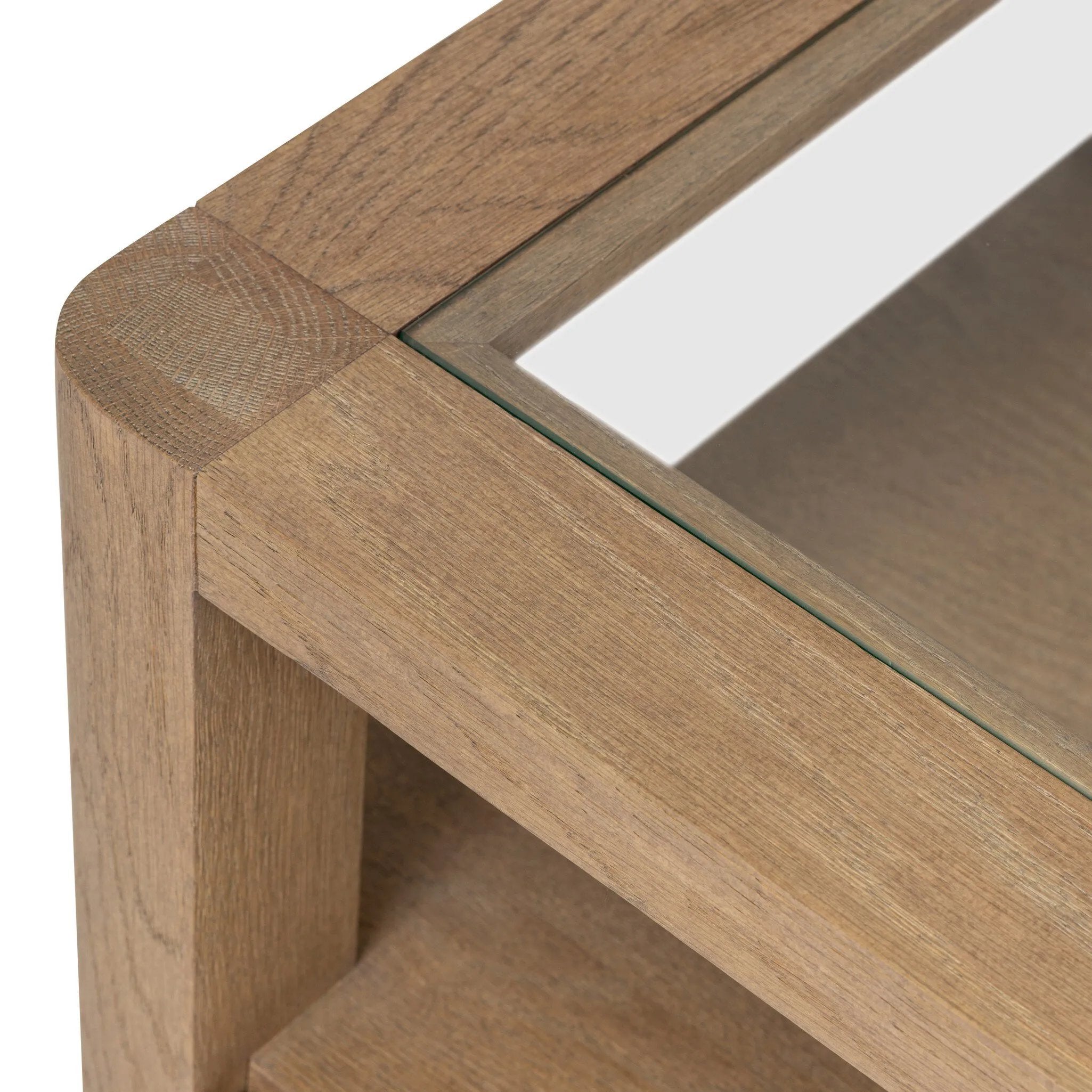Bring bonus storage and a light look to the living space. Made from sandy oak and clear tempered glass with a single drawer, shelving beneath the glass doubles as a shadowbox or an extra display surface.As lovers of clean materials at Amethyst, we love the designer inspired Shiloh End Table - Tempered Glass. Amethyst Home provides interior design, new home construction design consulting, vintage area rugs, and lighting in the Austin metro area.