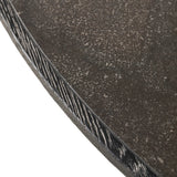 Mixed materials make for great drama. A cone-tapered base of dark oak supports a rounded tabletop of solid bluestone, with oak banding on the edges for thoughtful contrast Amethyst Home provides interior design, new home construction design consulting, vintage area rugs, and lighting in the Alpharetta metro area.