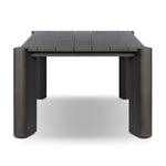 A Parsons-style outdoor dining table is defined by heavy proportions and angled, over-scaled legs. Crafted from bronze finished metal for a material statement. Cover or store indoors during inclement weather and when not in use.As lovers of wabi sabi materials at Amethyst, we love the nature inspired Soho Outdoor Metal Dining Table 86". Amethyst Home provides interior design, new home construction design consulting, vintage area rugs, and lighting in the Scottsdale metro area.