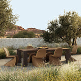 This Parsons-style outdoor dining table is defined by heavy proportions and over-scaled angled legs. Crafted from reclaimed wood and finished with a heritage brown stain to showcase natural cracks and patches for added character. Cover or store indoors during inclement weather and when not in use Amethyst Home provides interior design, new home construction design consulting, vintage area rugs, and lighting in the Calabasas metro area.