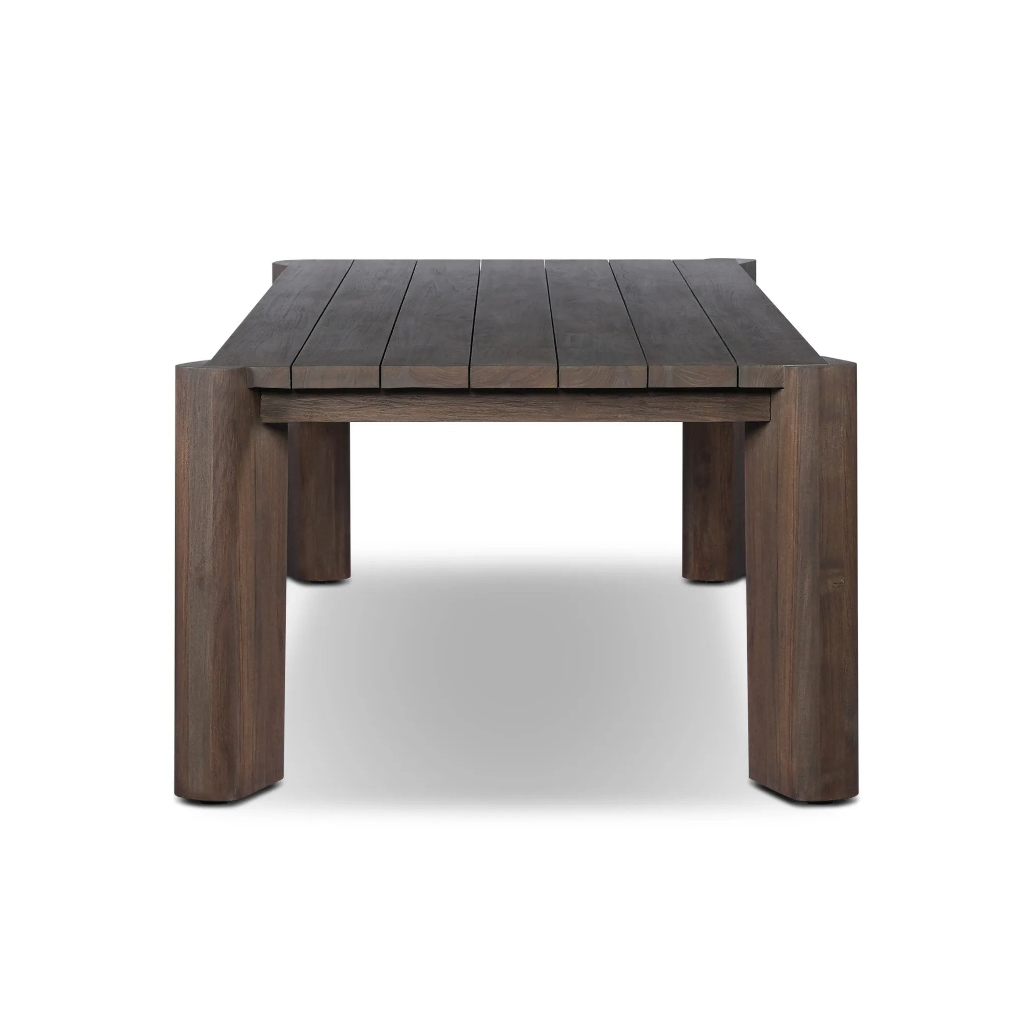 This Parsons-style outdoor dining table is defined by heavy proportions and over-scaled angled legs. Crafted from reclaimed wood and finished with a heritage brown stain to showcase natural cracks and patches for added character. Cover or store indoors during inclement weather and when not in use Amethyst Home provides interior design, new home construction design consulting, vintage area rugs, and lighting in the Kansas City metro area.