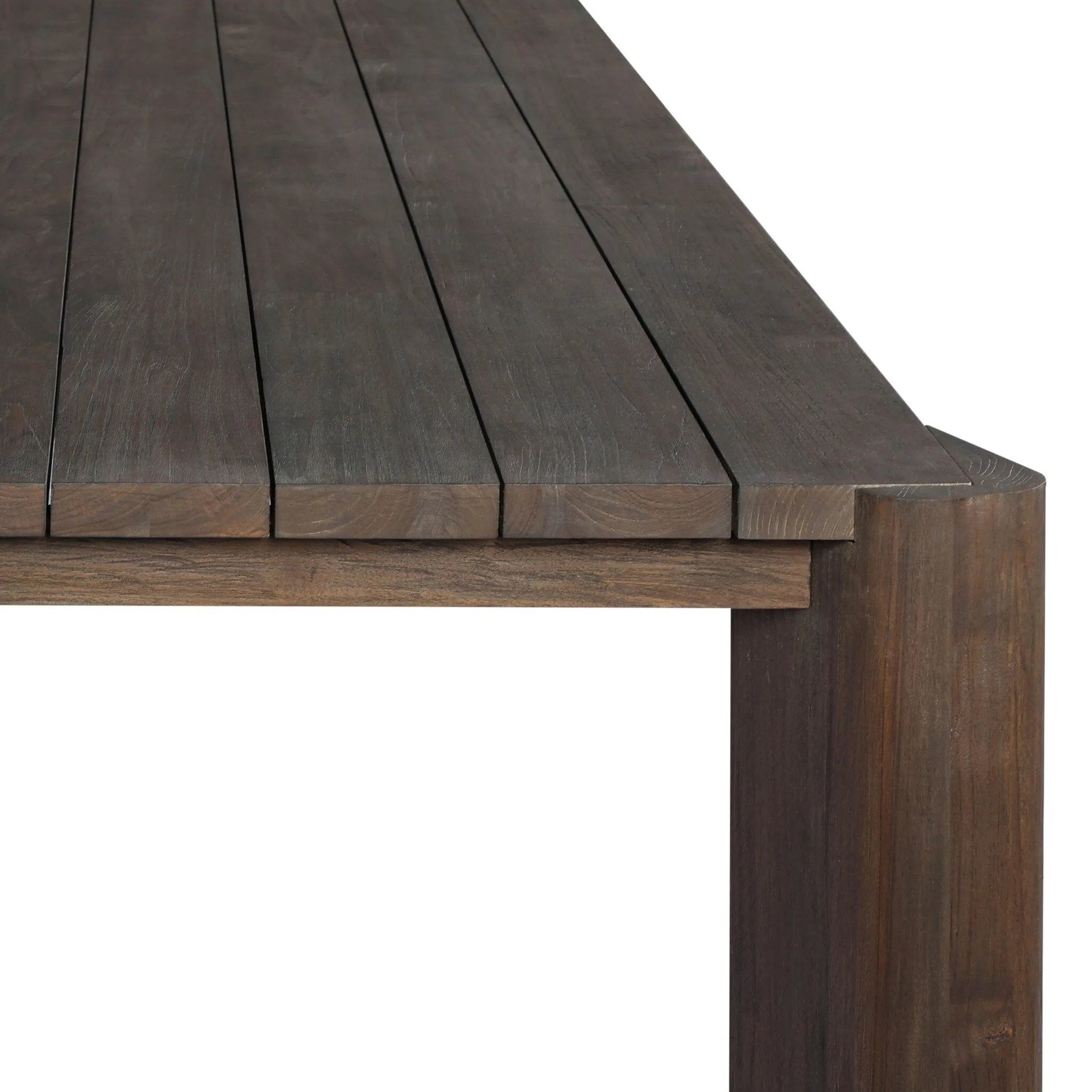 This Parsons-style outdoor dining table is defined by heavy proportions and over-scaled angled legs. Crafted from reclaimed wood and finished with a heritage brown stain to showcase natural cracks and patches for added character. Cover or store indoors during inclement weather and when not in use Amethyst Home provides interior design, new home construction design consulting, vintage area rugs, and lighting in the Tampa metro area.