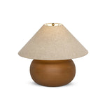 Inspired by vintage vessels, a stout table lamp bears the unique markings of natural terracotta. Topped with a neutral linen shade for texture and contrast Amethyst Home provides interior design, new home construction design consulting, vintage area rugs, and lighting in the Tampa metro area.