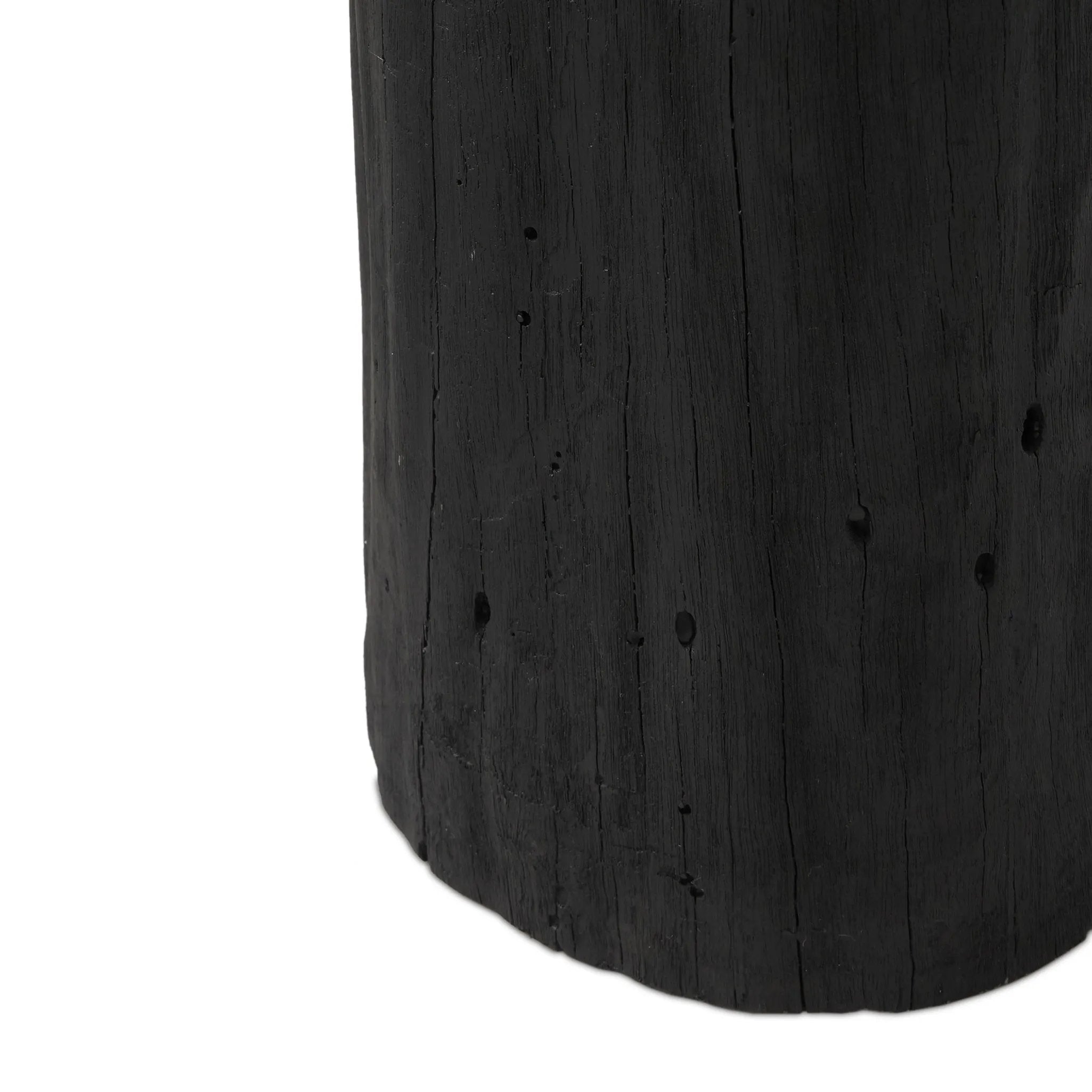 Ground any room with a style inspired by the beautiful simplicity of nature. Made of black-finished resin, the form for this special piece is molded from a tree trunk, then cast in resin to recreate the same shape and texture of the trunk — talk about a true statement piece Amethyst Home provides interior design, new home construction design consulting, vintage area rugs, and lighting in the Nashville metro area.