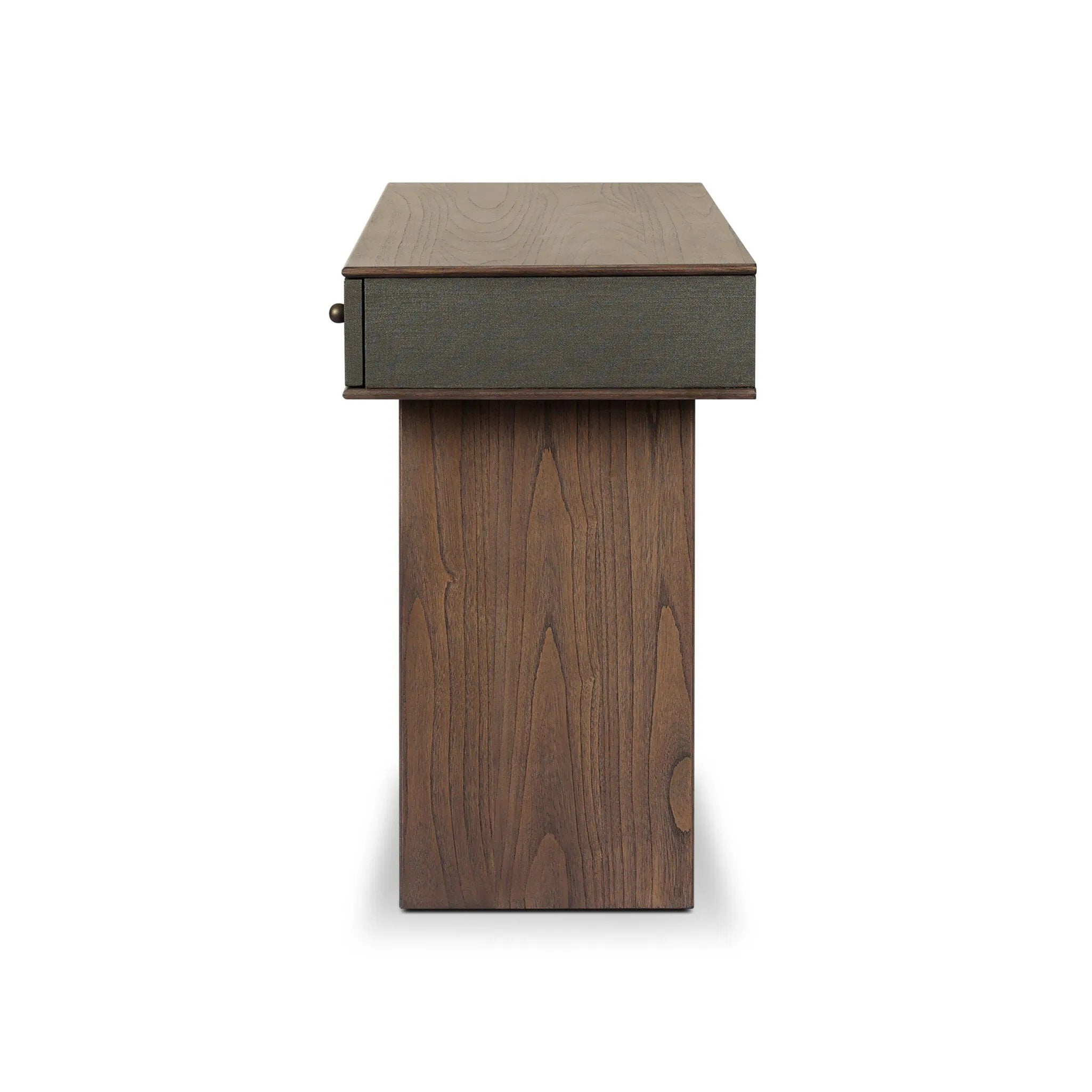 Warm, timeless woods pair with painted linen drawers fronts lacquered in a dark green, for a updated bohemian look. Complete with three drawers for media needs and more.As enthusiasts of modern style at Amethyst, we love the optimistic inspired Soloman Console Table - Stained Saddle Brown Sungkai Veneer. Amethyst Home provides interior design, new home construction design consulting, vintage area rugs, and lighting in the Alpharetta metro area.