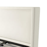 A shorter wingspan and geometric cutouts define this modern-day shelter wingback bed, designed for comfort from every angle. Upholstered in a cream fabric with subtle texture and a soft hand Amethyst Home provides interior design, new home construction design consulting, vintage area rugs, and lighting in the Austin metro area.