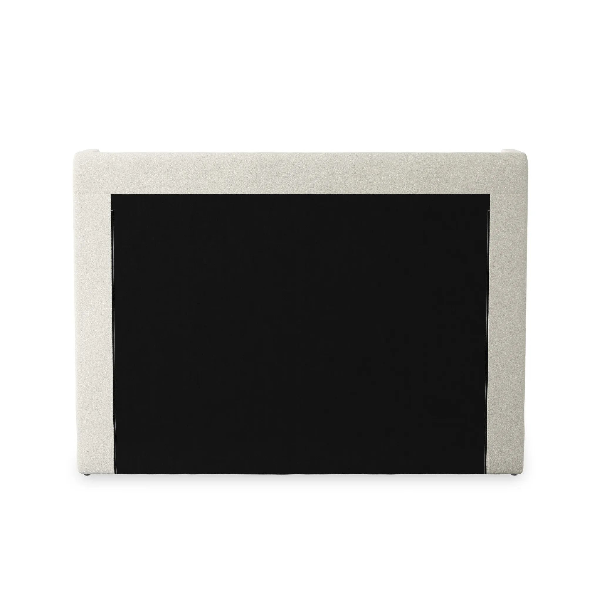 A shorter wingspan and geometric cutouts define this modern-day shelter wingback bed, designed for comfort from every angle. Upholstered in a cream fabric with subtle texture and a soft hand Amethyst Home provides interior design, new home construction design consulting, vintage area rugs, and lighting in the Nashville metro area.