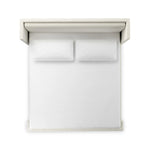 A shorter wingspan and geometric cutouts define this modern-day shelter wingback bed, designed for comfort from every angle. Upholstered in a cream fabric with subtle texture and a soft hand Amethyst Home provides interior design, new home construction design consulting, vintage area rugs, and lighting in the Salt Lake City metro area.