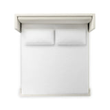 A shorter wingspan and geometric cutouts define this modern-day shelter wingback bed, designed for comfort from every angle. Upholstered in a cream fabric with subtle texture and a soft hand Amethyst Home provides interior design, new home construction design consulting, vintage area rugs, and lighting in the Salt Lake City metro area.