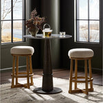 Featuring Staria Saxon Sand Swivel Stool by Four Hands at Amethyst Home. Perfectly sized for the counter, a 360-degree swivel stool pairs a warm oak frame with sand seating in a chunky basketweave. Tapered legs meet a crossed base ties it all together. Overall Dimensions: 18.25"w x 18.25"d x 27.50"h. Amethyst Home provides interior design, new home construction design consulting, vintage area rugs, and lighting in the Boston metro area.