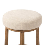 Featuring Staria Saxon Sand Swivel Stool by Four Hands at Amethyst Home. Perfectly sized for the counter, a 360-degree swivel stool pairs a warm oak frame with sand seating in a chunky basketweave. Tapered legs meet a crossed base ties it all together. Overall Dimensions: 18.25"w x 18.25"d x 27.50"h. Amethyst Home provides interior design, new home construction design consulting, vintage area rugs, and lighting in the Los Angeles metro area.