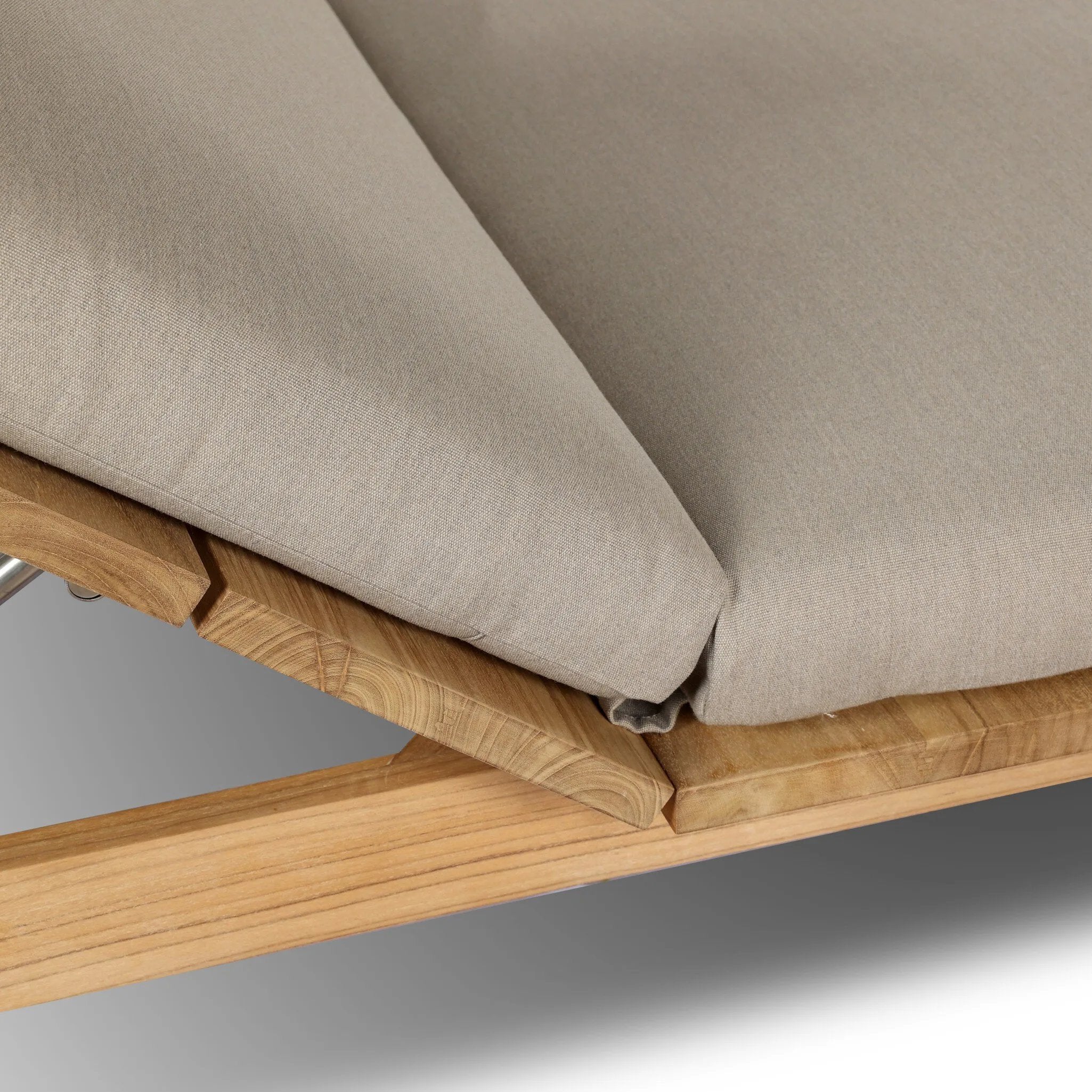 Grade A teak is fine sanded into a soft, unfinished outdoor double chaise that highlights the wood's natural grain, thick cushioning for a sink-in feel. Cover or store inside during inclement weather and when not in use.As fans of natural style at Amethyst, we love the designer inspired Sterling Outdoor Double Chaise - Ibiza Mole. Amethyst Home provides interior design, new home construction design consulting, vintage area rugs, and lighting in the Houston metro area.