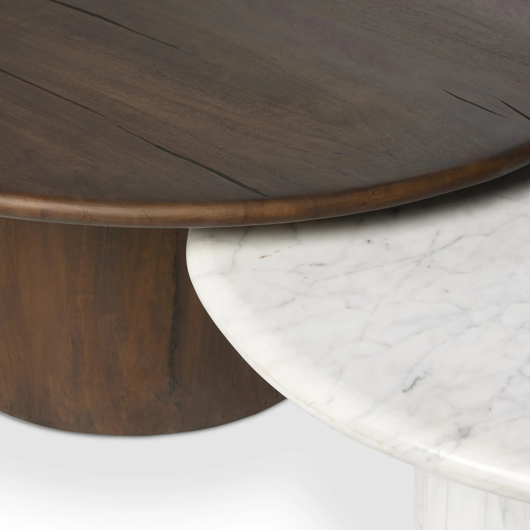 Featuring Stuart White Calacatta Marble Nesting Coffee Tables - MIX & Match by Four Hands at Amethyst Home. Elevate the look of your living space with a nest-style set of coffee tables — one larger table made from mixed reclaimed woods and a smaller table of white Calacatta marble. Together, they make for a true mixed materials moment.Large Marble, Small WoodOv. Amethyst Home provides interior design, new home construction design consulting, vintage area rugs, and lighting in the Miami metro area.