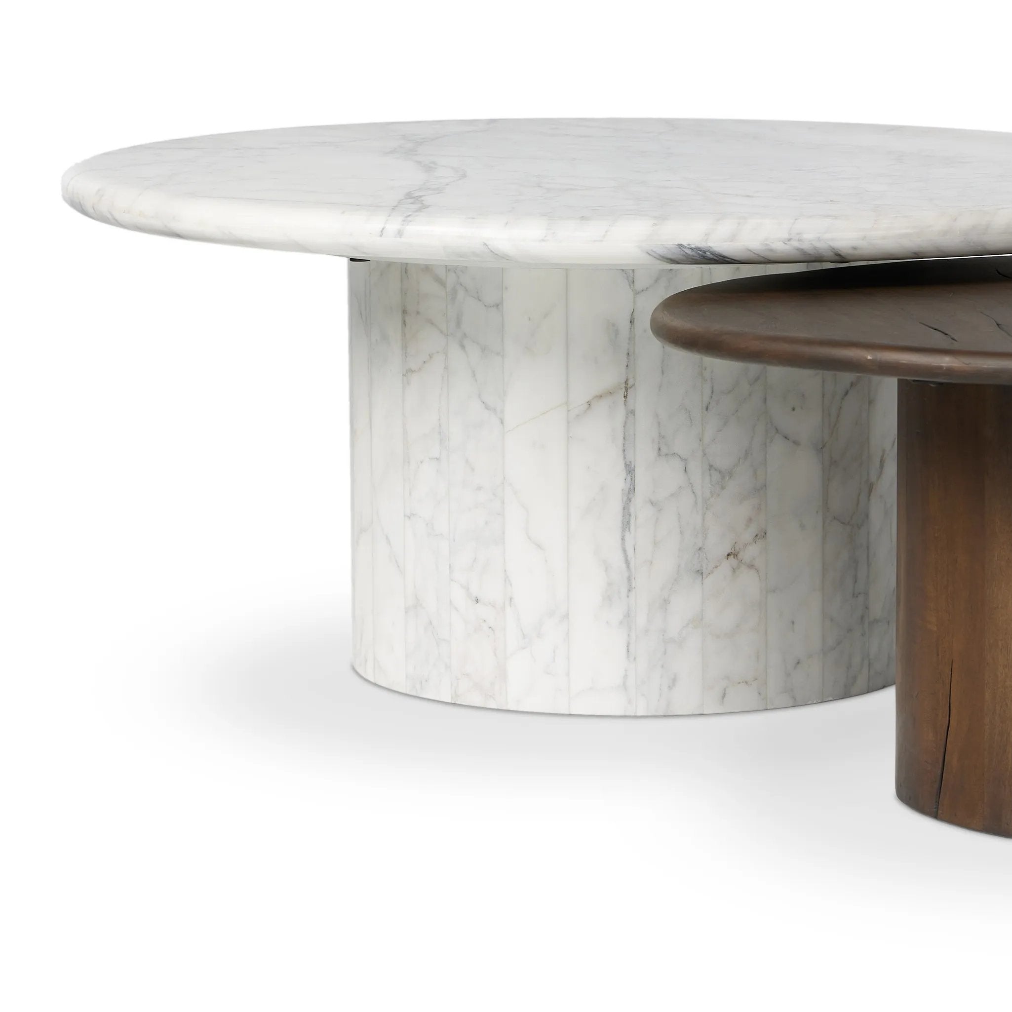 Featuring Stuart White Calacatta Marble Nesting Coffee Tables - MIX & Match by Four Hands at Amethyst Home. Elevate the look of your living space with a nest-style set of coffee tables — one larger table made from mixed reclaimed woods and a smaller table of white Calacatta marble. Together, they make for a true mixed materials moment.Large Marble, Small WoodOv. Amethyst Home provides interior design, new home construction design consulting, vintage area rugs, and lighting in the Tampa metro area.
