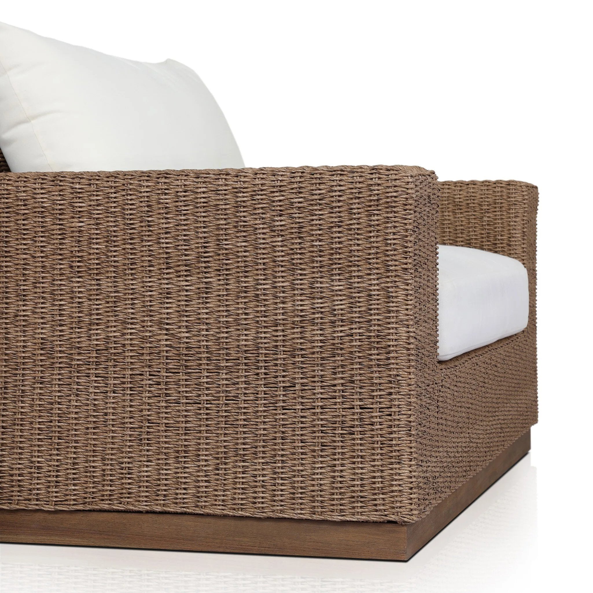 Featuring Suri Arashi Salt Outdoor Chair by Four Hands at Amethyst Home. Elevate your outdoors. A wide-format outdoor chair features a faux hyacinth frame and plinth base. Linear details and a boxy silhouette make this piece truly timeless, while a knife-edge back  cushion softens the whole look. Upholstered in 100% olefin, known for its UV-resistant, wate. Amethyst Home provides interior design, new home construction design consulting, vintage area rugs, and lighting in the Des Moines metro area.