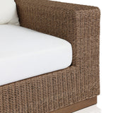 Featuring Suri Arashi Salt Outdoor Chair by Four Hands at Amethyst Home. Elevate your outdoors. A wide-format outdoor chair features a faux hyacinth frame and plinth base. Linear details and a boxy silhouette make this piece truly timeless, while a knife-edge back  cushion softens the whole look. Upholstered in 100% olefin, known for its UV-resistant, wat. Amethyst Home provides interior design, new home construction design consulting, vintage area rugs, and lighting in the Kansas City metro area.