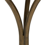 Hammered aged brass forms a tulip-shaped base with ball details for a design-forward touch. Bullnose edges on a rounded fossil marble tabletop soften the whole look Amethyst Home provides interior design, new home construction design consulting, vintage area rugs, and lighting in the Calabasas metro area.